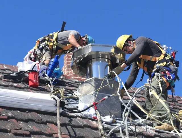 Protective chimney cap installed by Wesley Chapel Chimney Sweep in Wesley Chapel, FL