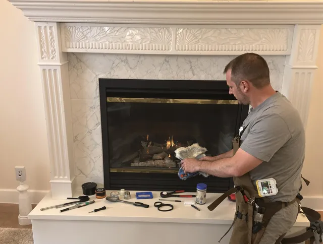 Wesley Chapel Chimney Sweep performing fireplace maintenance in Wesley Chapel, FL
